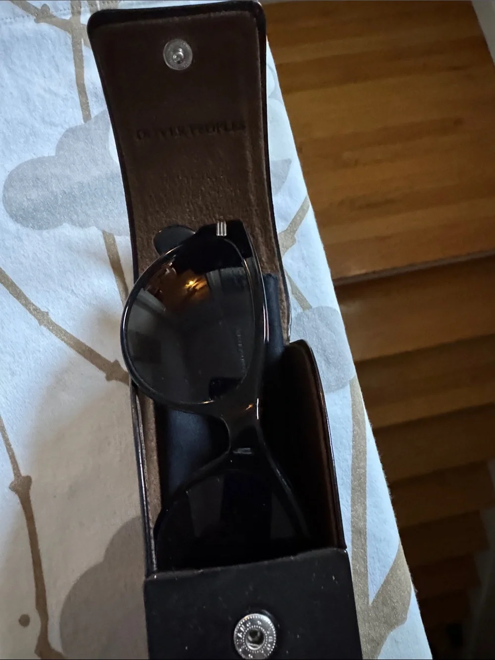 Oliver Peoples Black Sunglasses in Leather Case